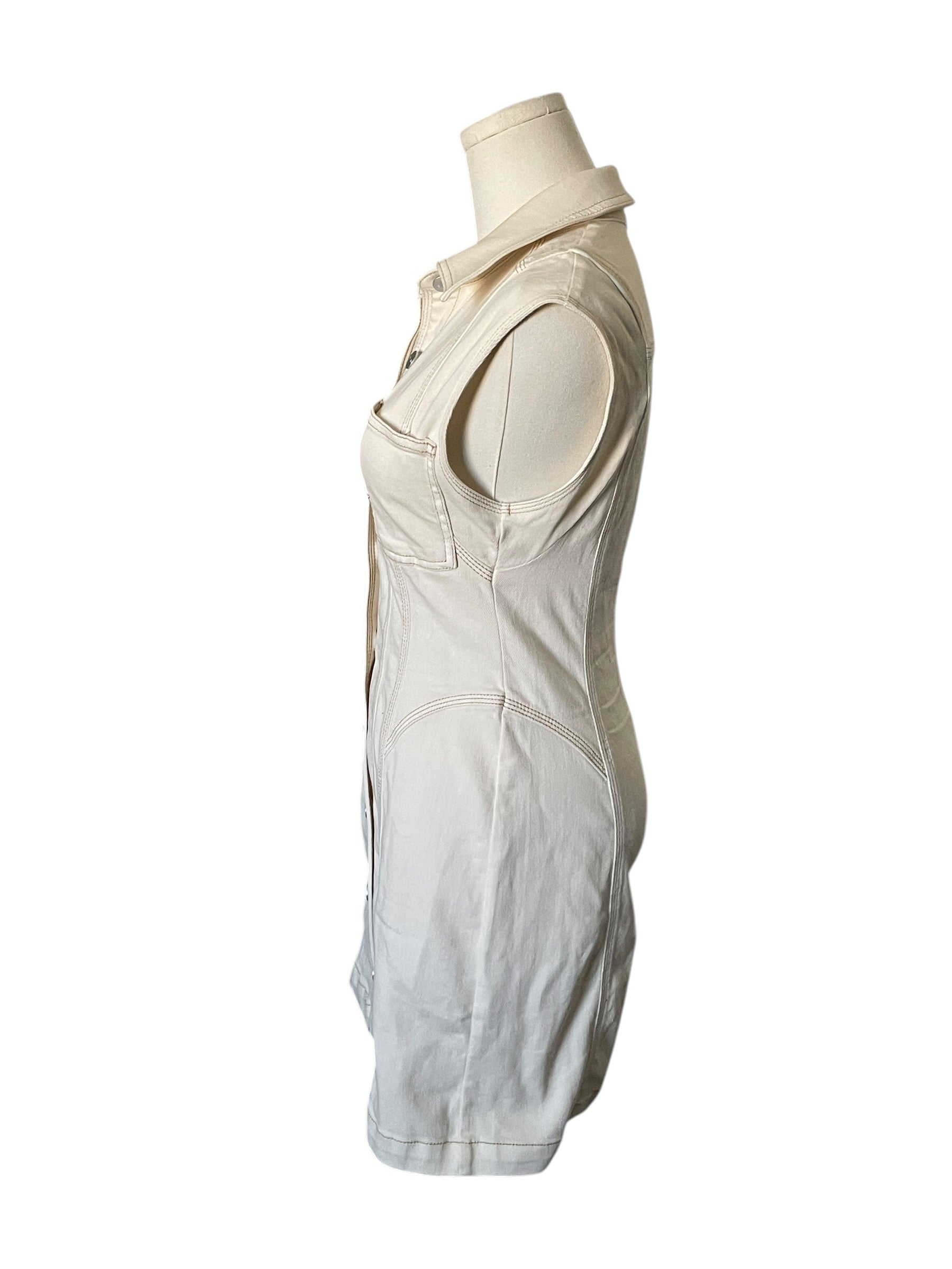 White sleeveless dress on a mannequin against a white background
