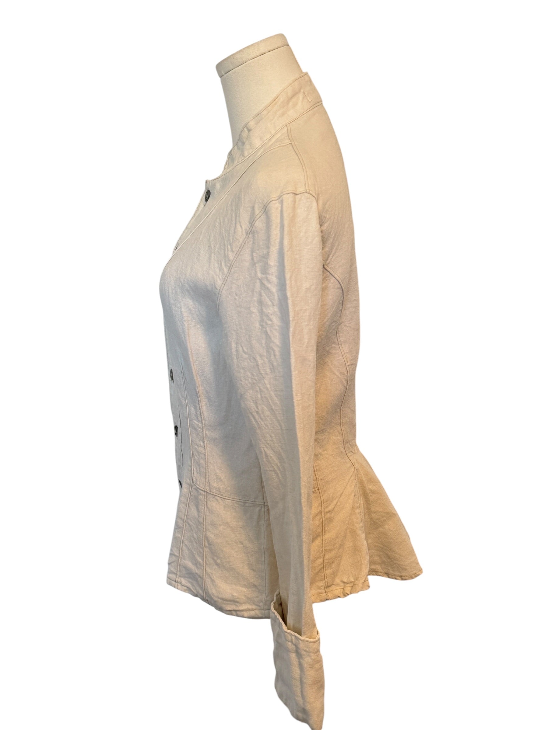 Beige jacket on a mannequin against a white background