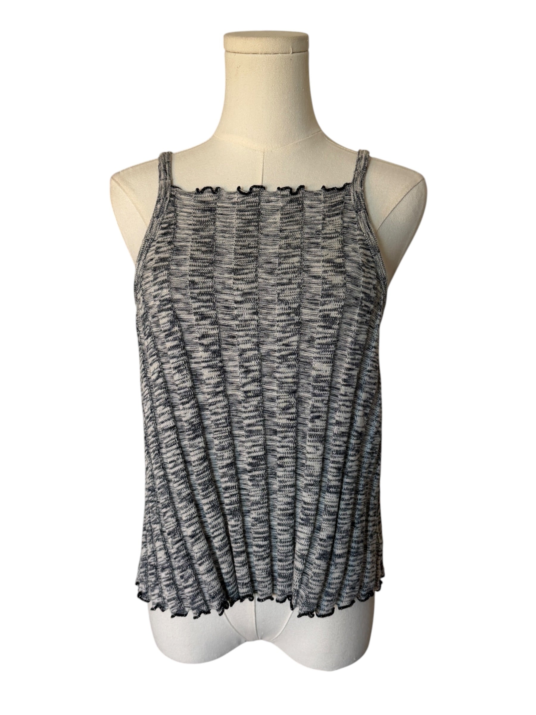 Black and gray patterned tank top on a mannequin against a white background