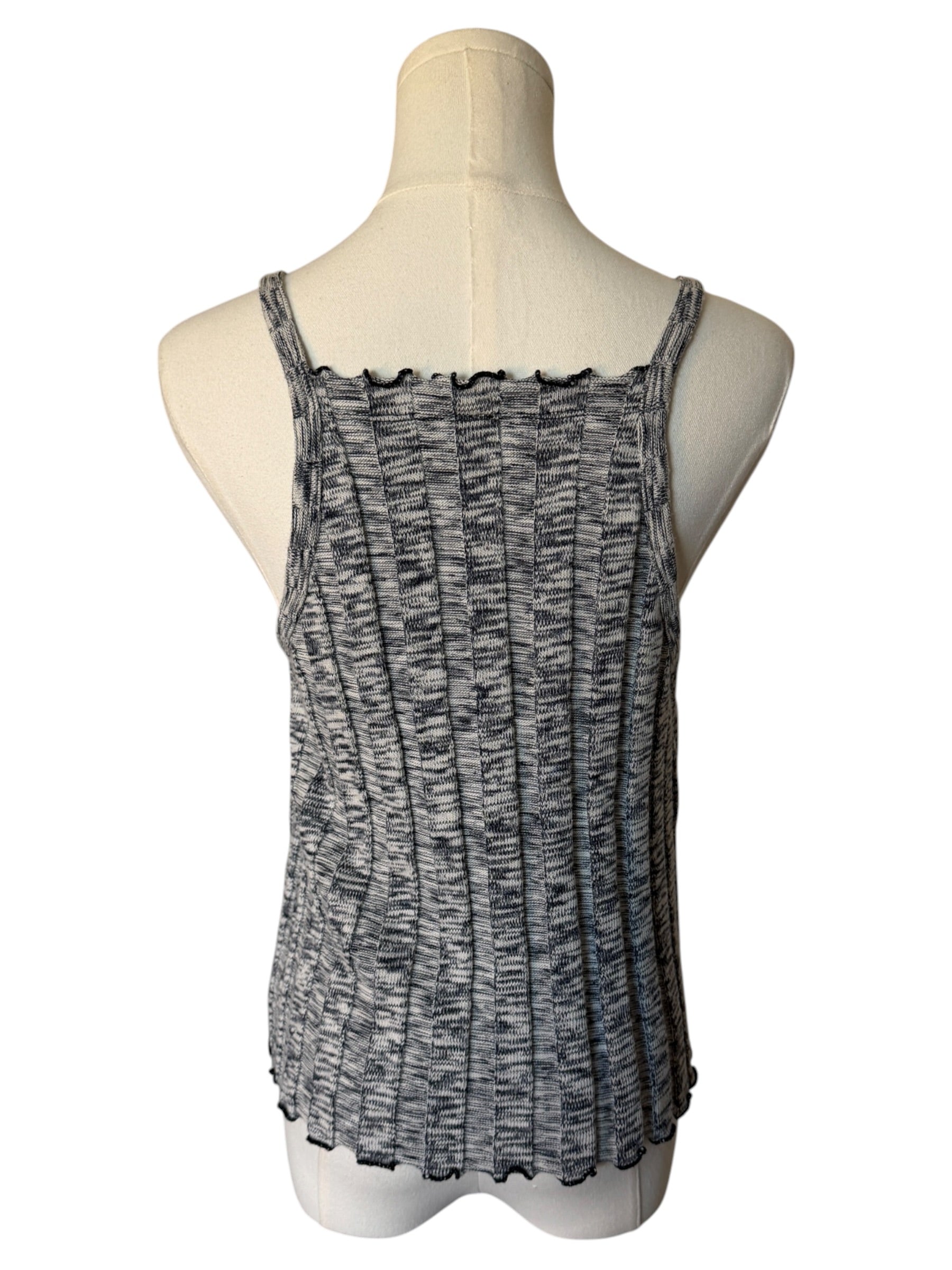 Black and gray patterned tank top on a mannequin against a white background