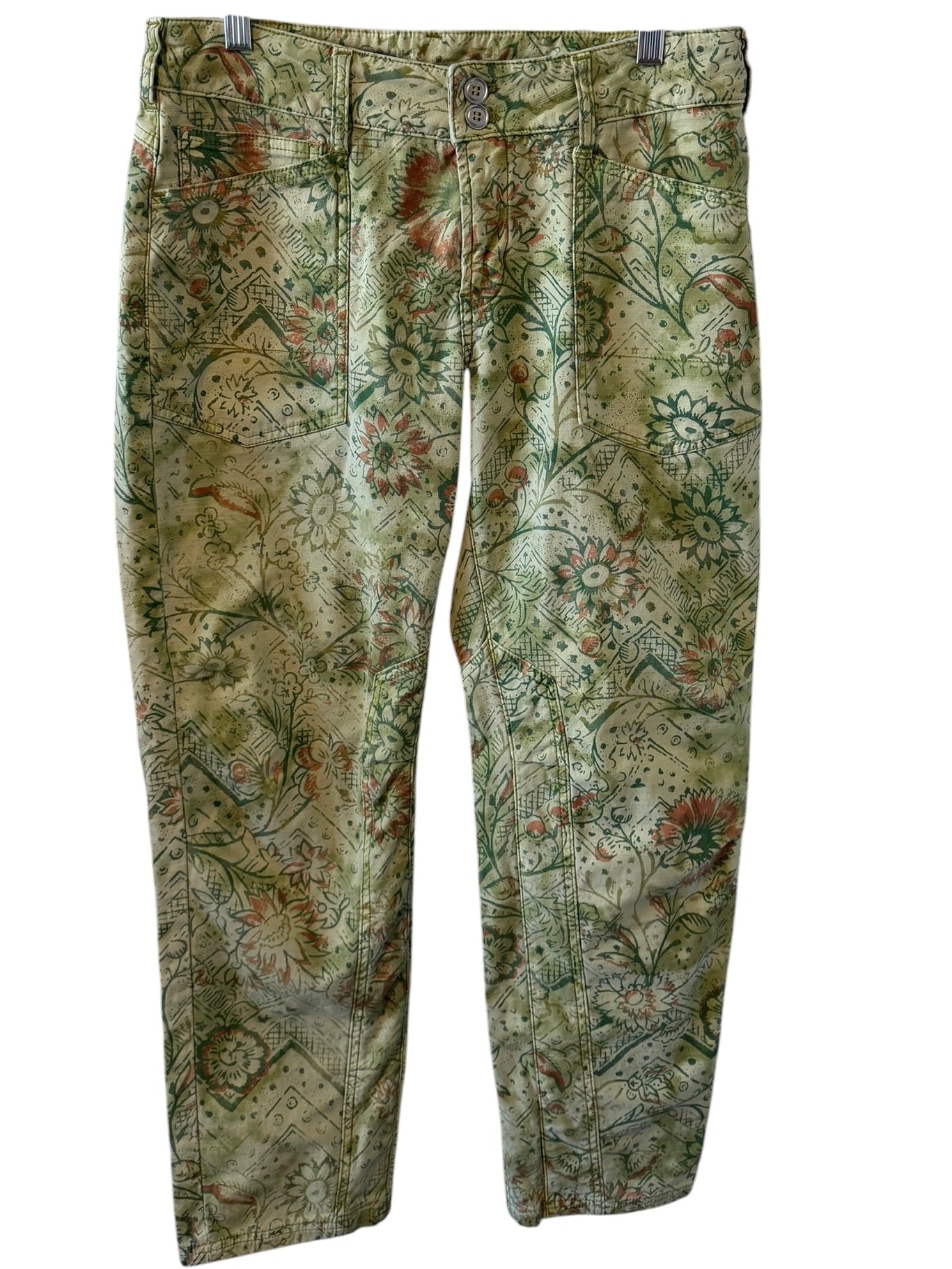 Green camouflage pants on a white background
