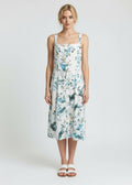Woman wearing a floral dress on a white background