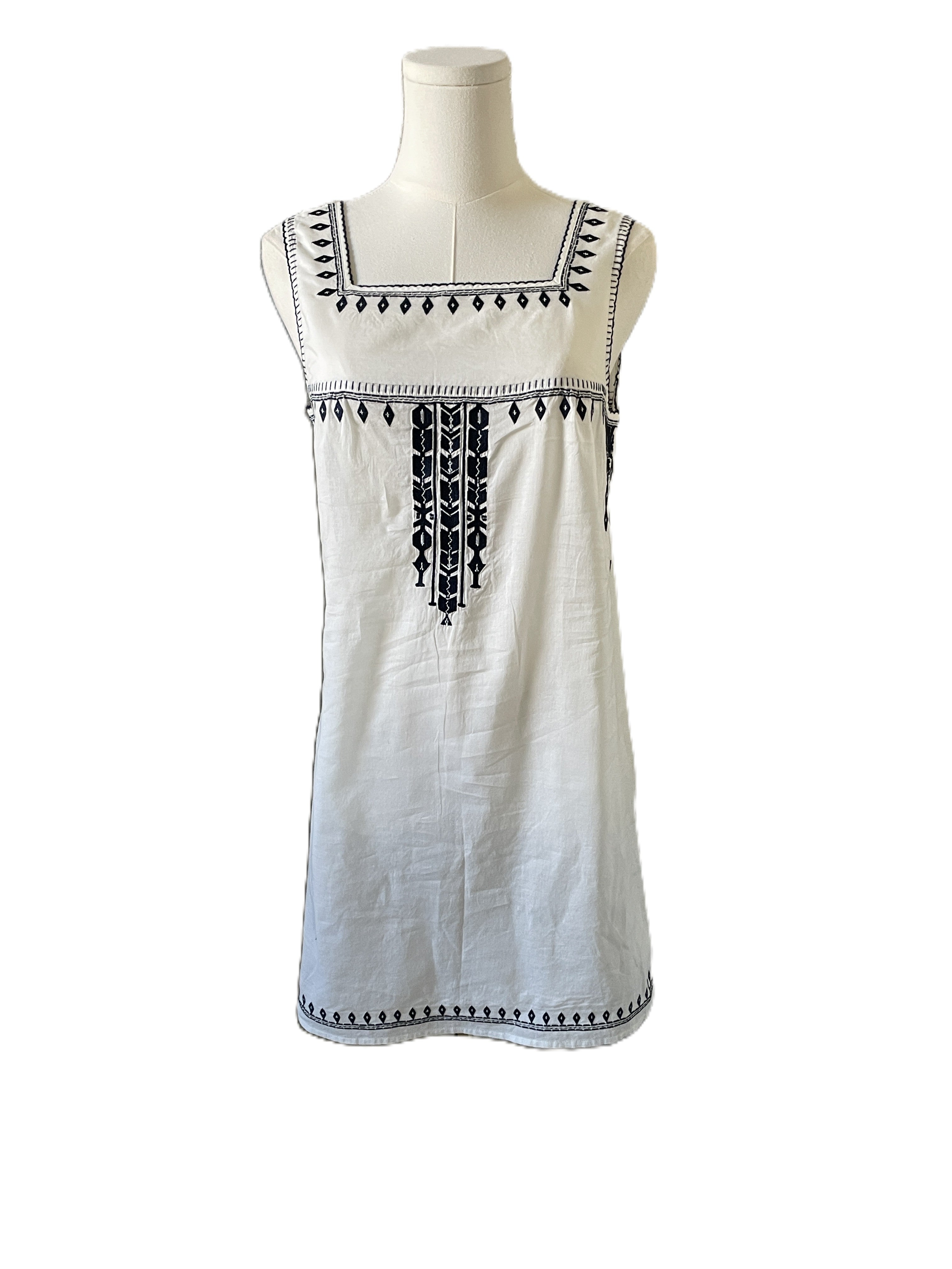 White mini dress with embroidered details 