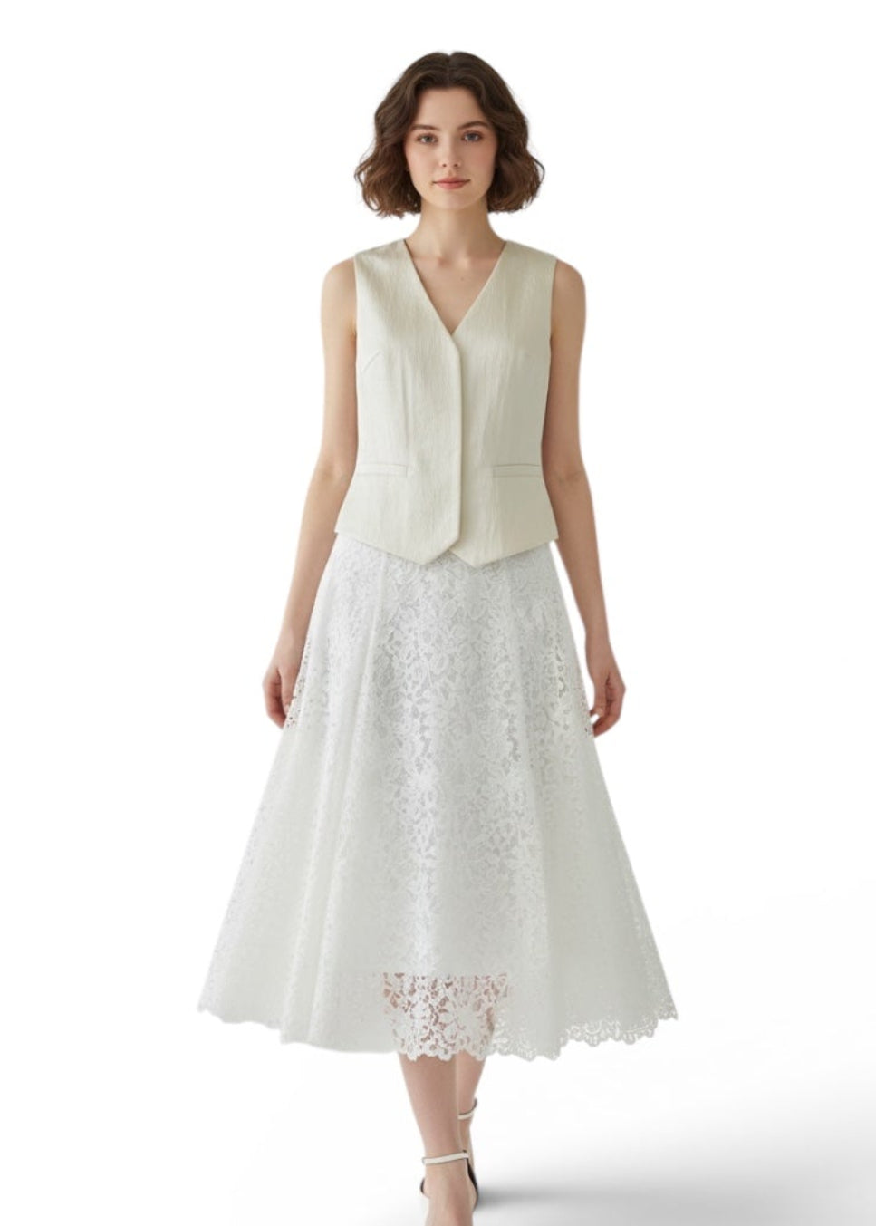 Woman wearing a white dress with a plain background