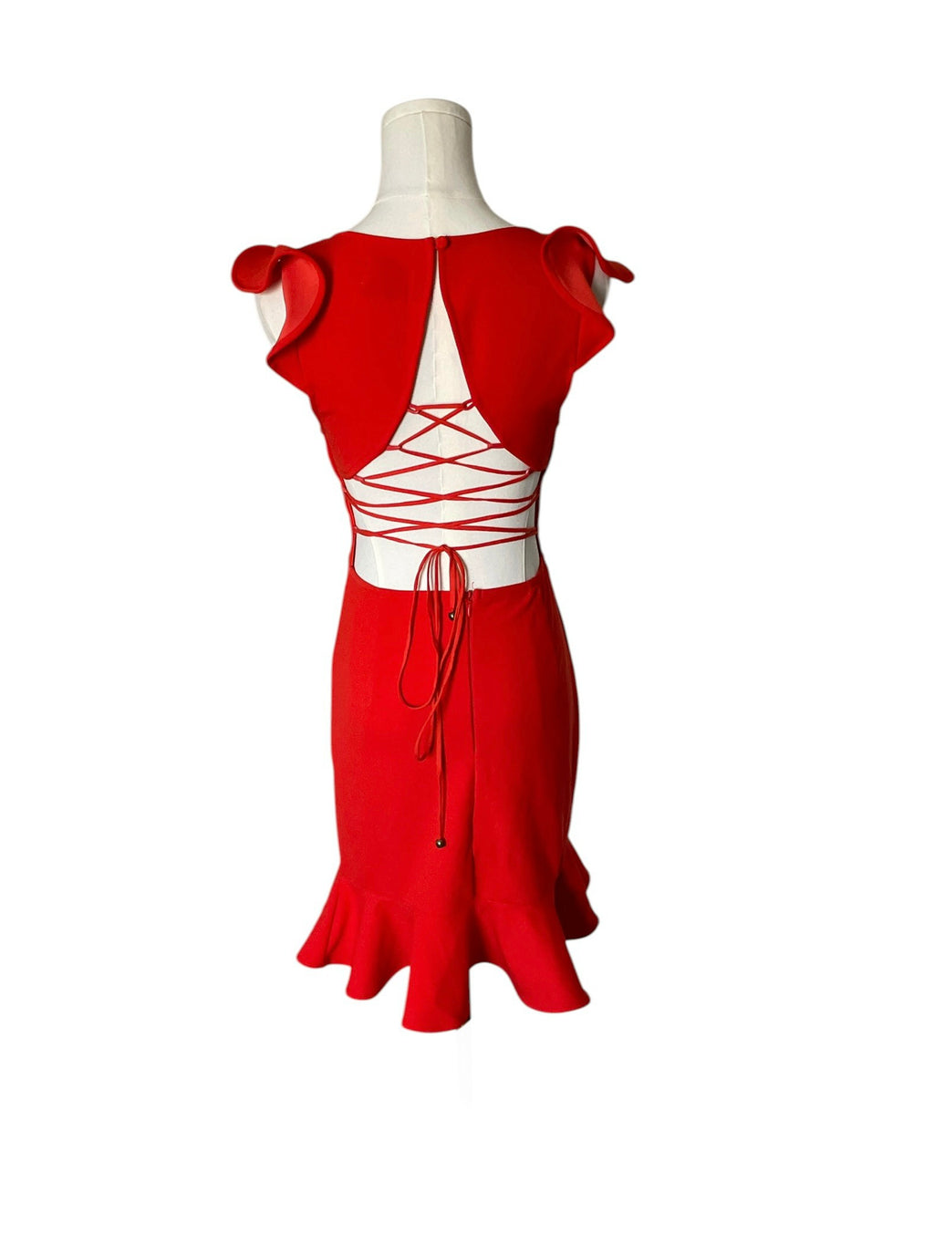Red dress with white lace top on a mannequin against a white background
