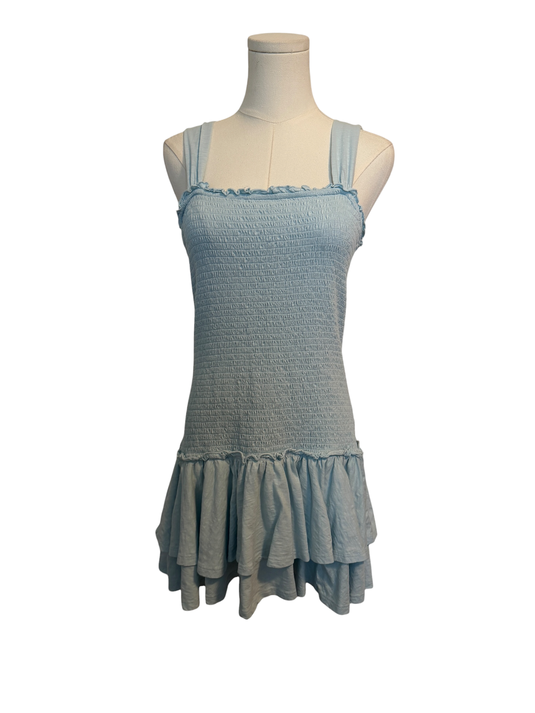 Light blue dress on a mannequin against a white background