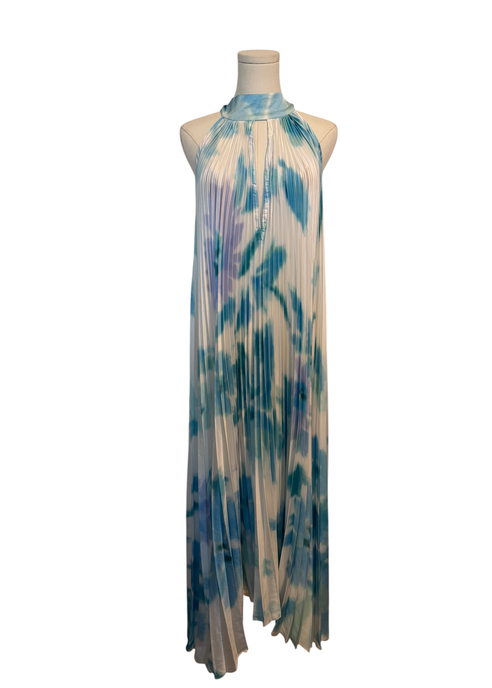 Tie-dye dress on a mannequin against a white background