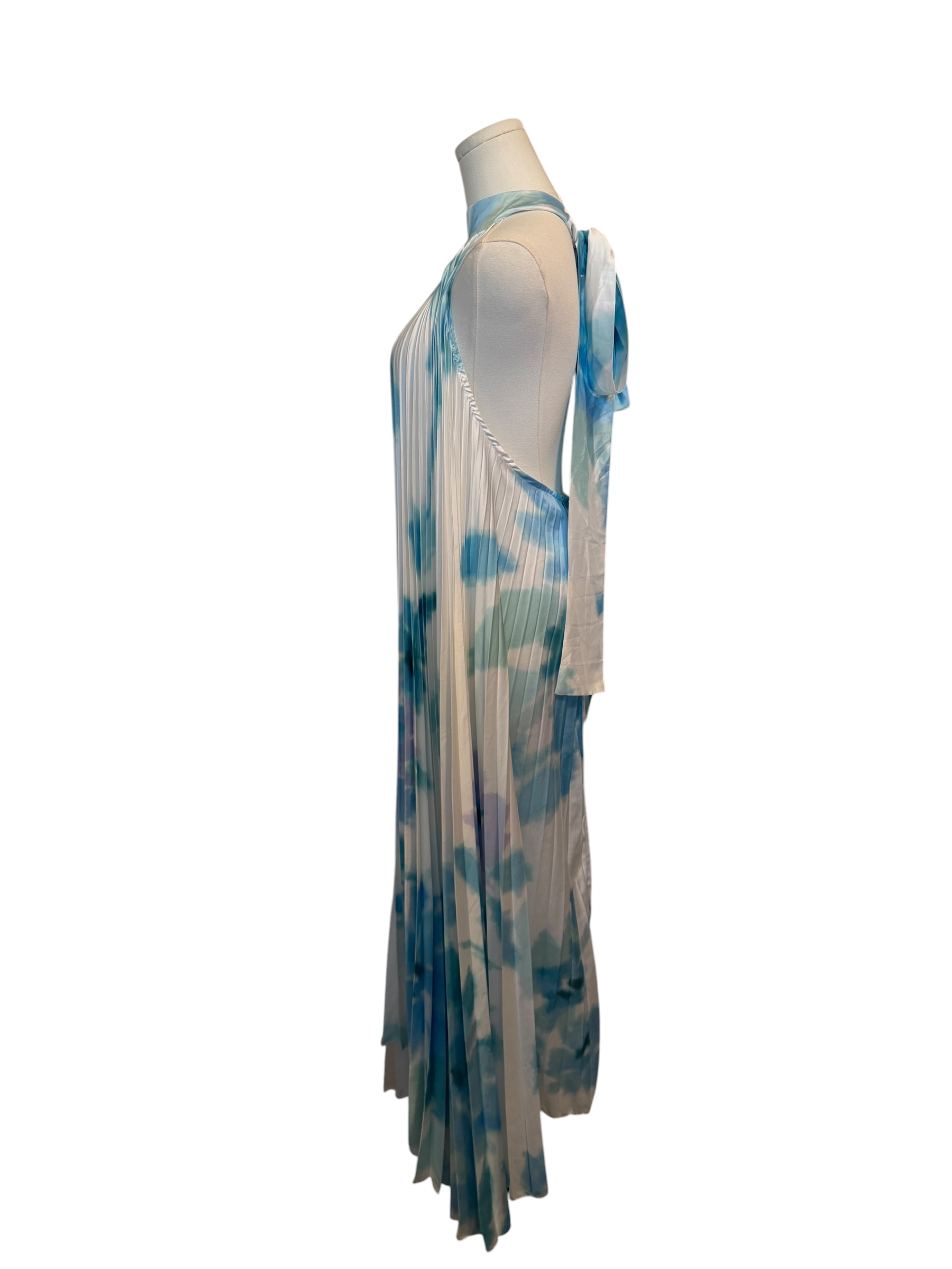 Mannequin wearing a blue and white patterned dress on a white background