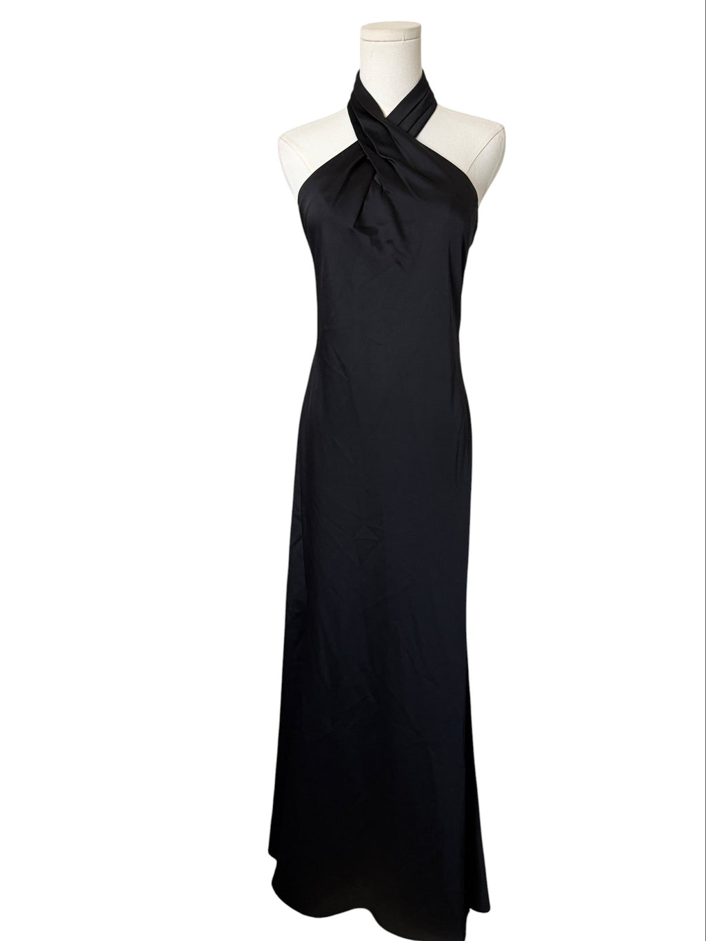 Black halter neck dress on a mannequin against a white background