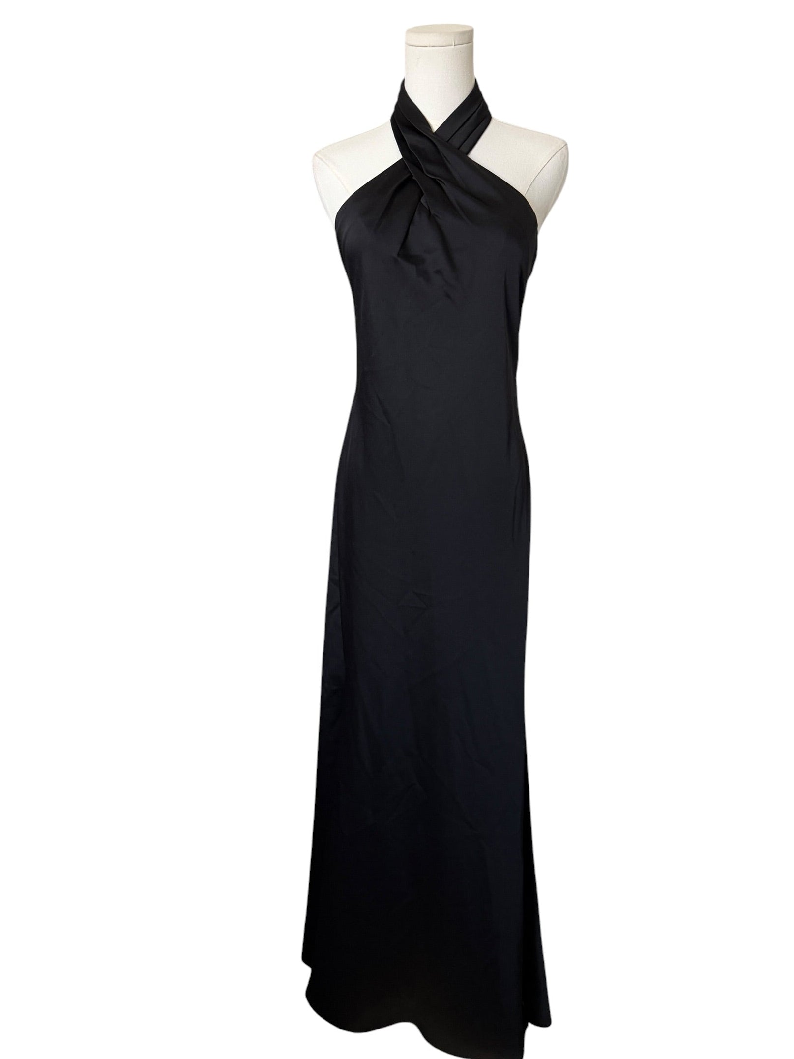 Black halter neck dress on a mannequin against a white background