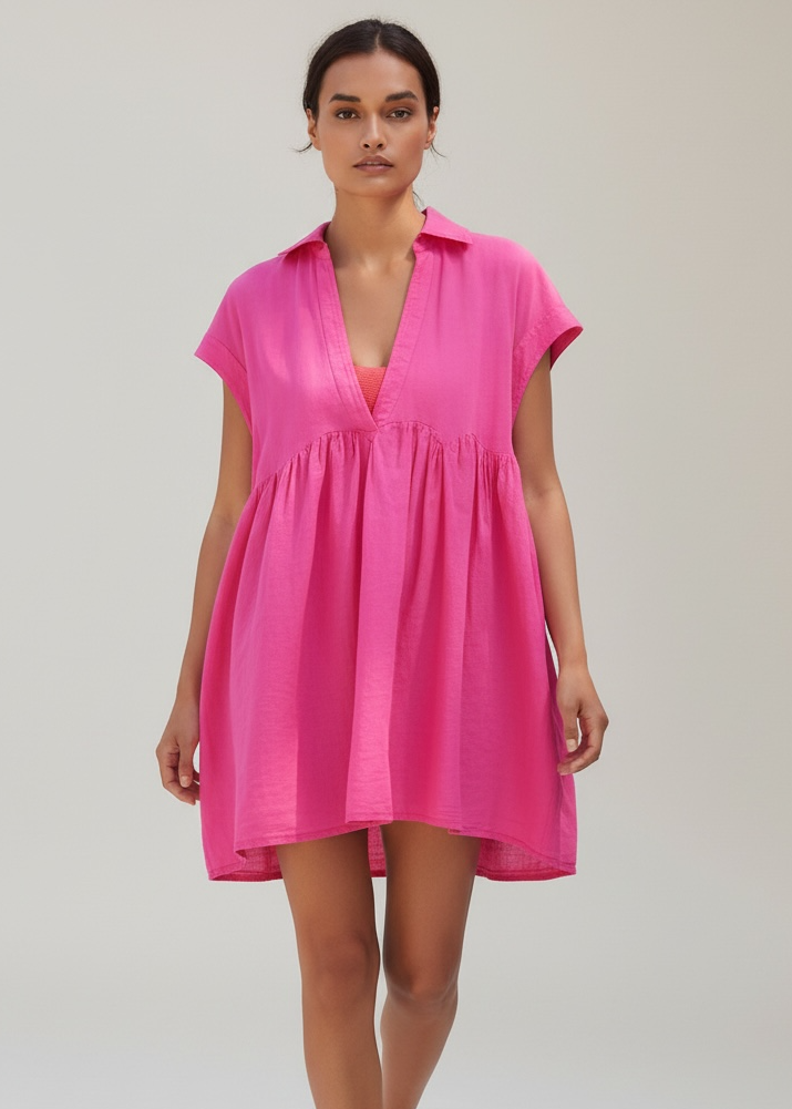 Woman wearing a bright pink dress on a white background
