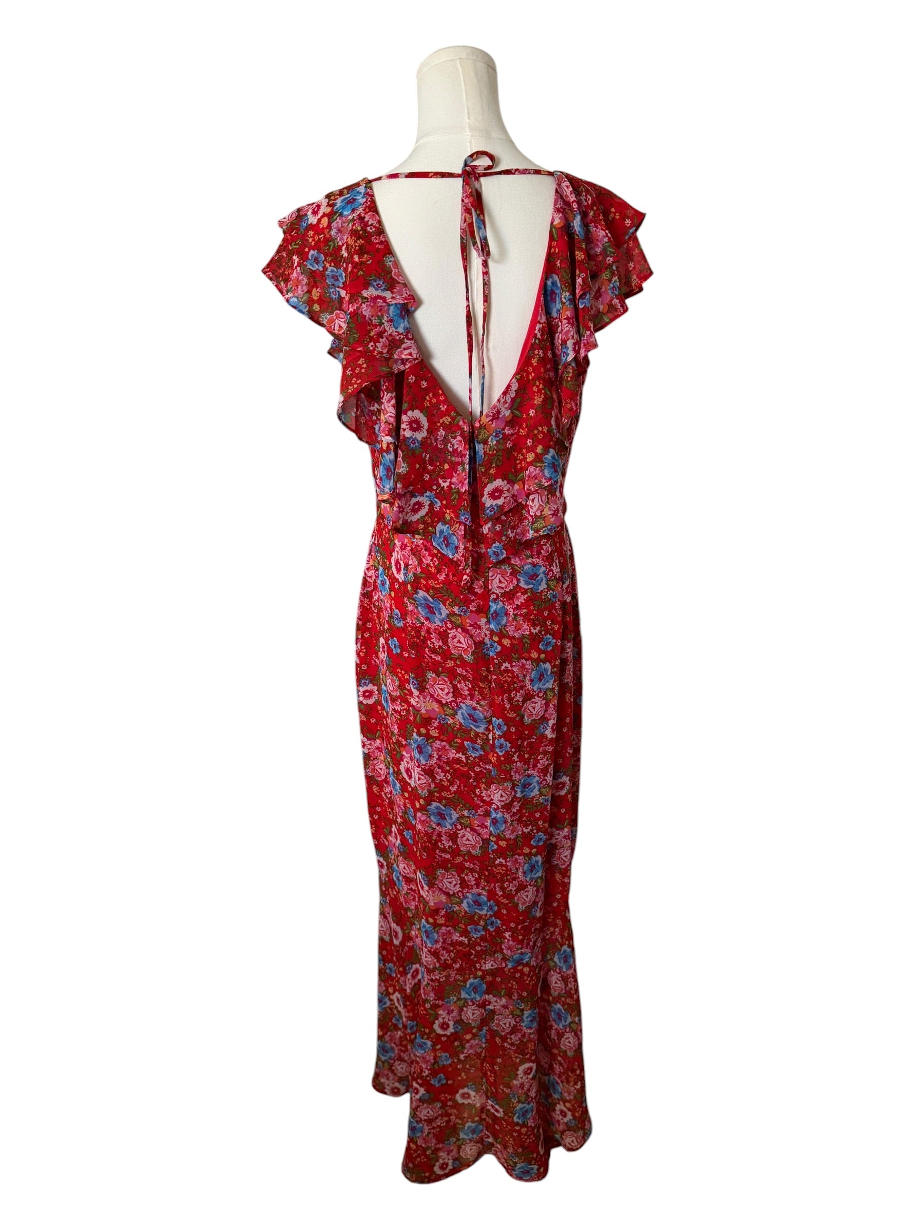 Red floral dress on a mannequin against a white background