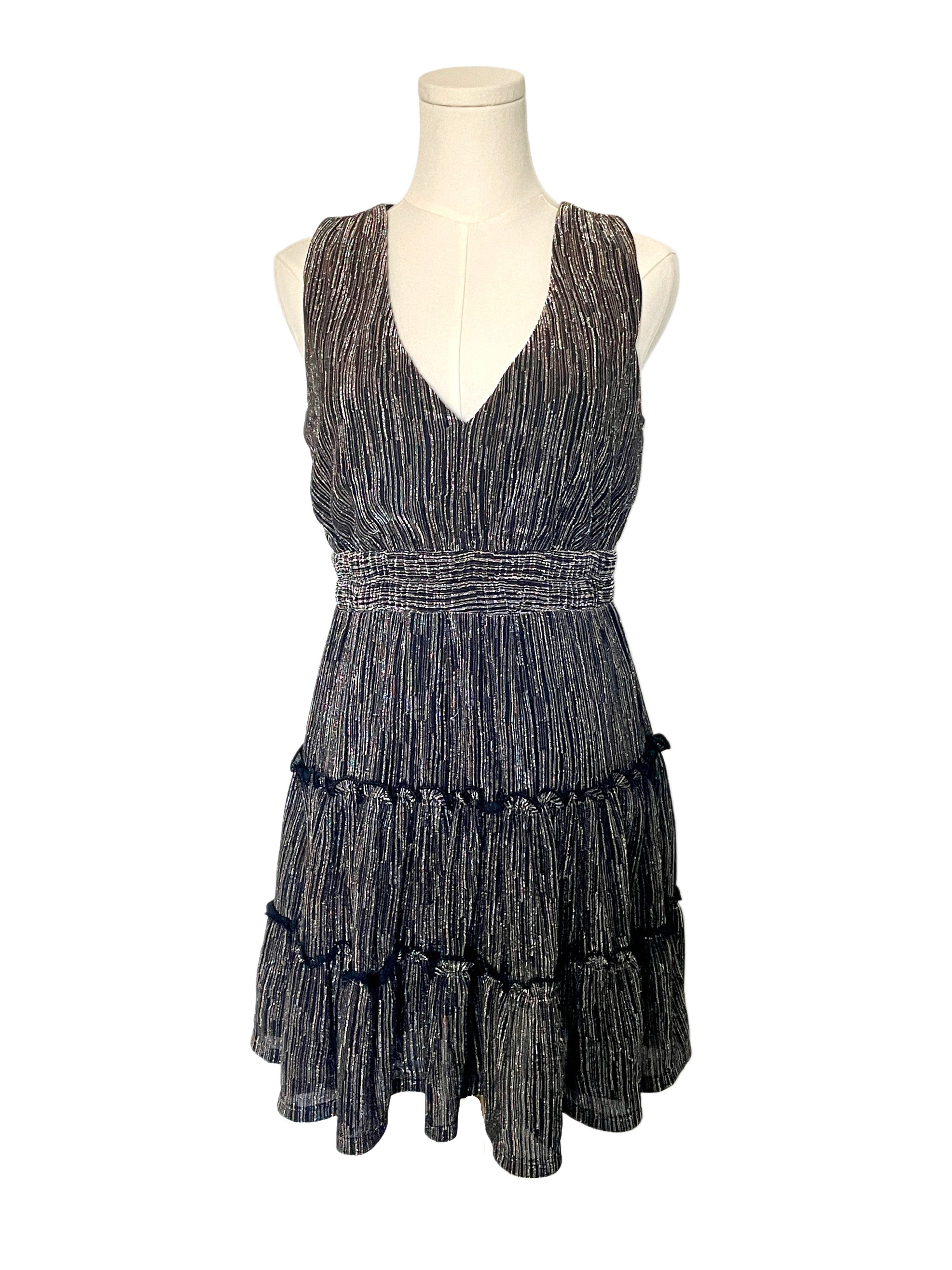 Mini sleeveless dress with tie in back and ruffles 