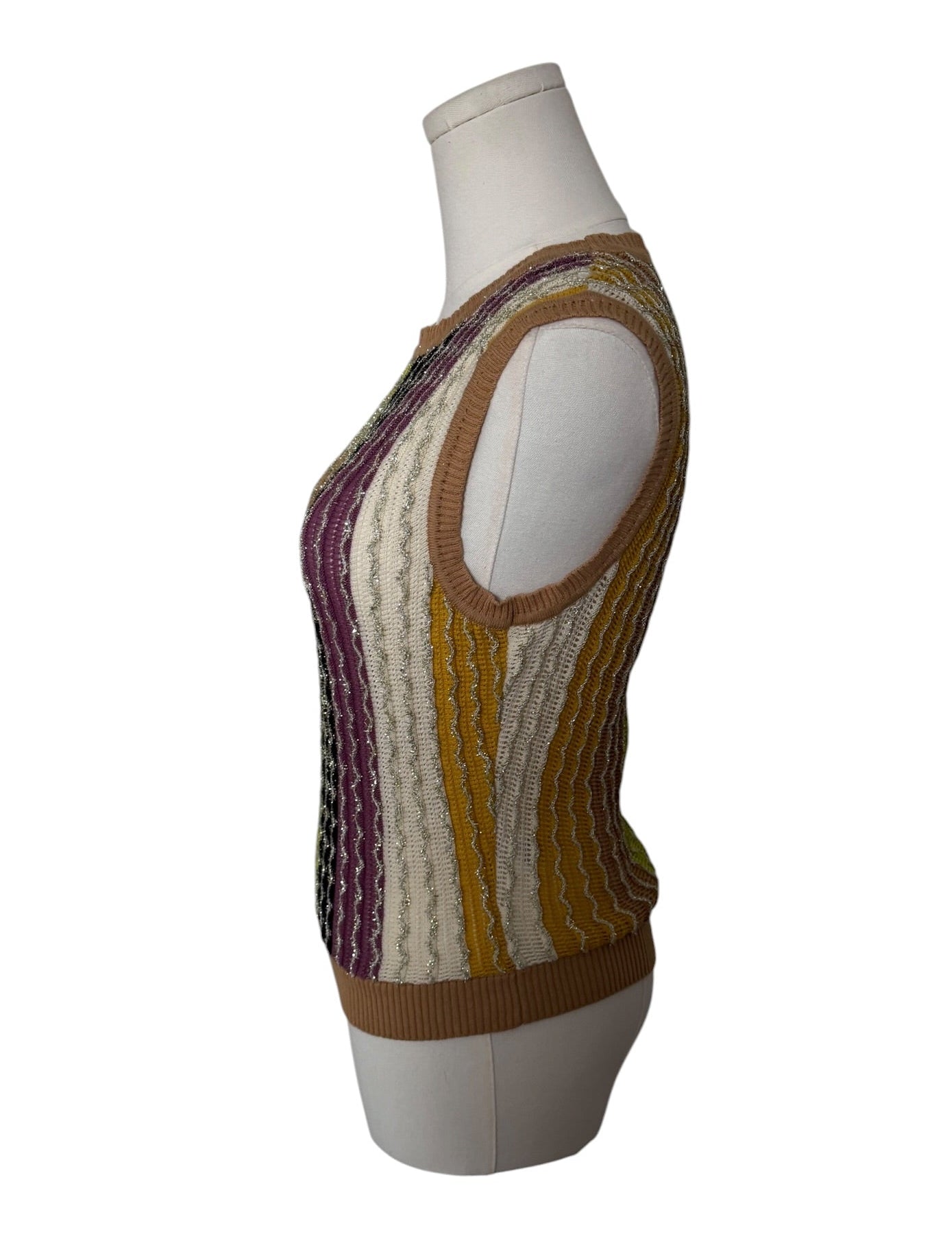 Multicolored sleeveless knitted top on a mannequin against a white background