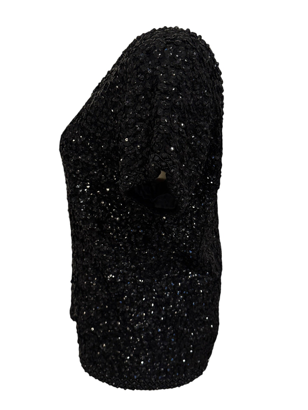Black glittery one-shoulder top on a white background