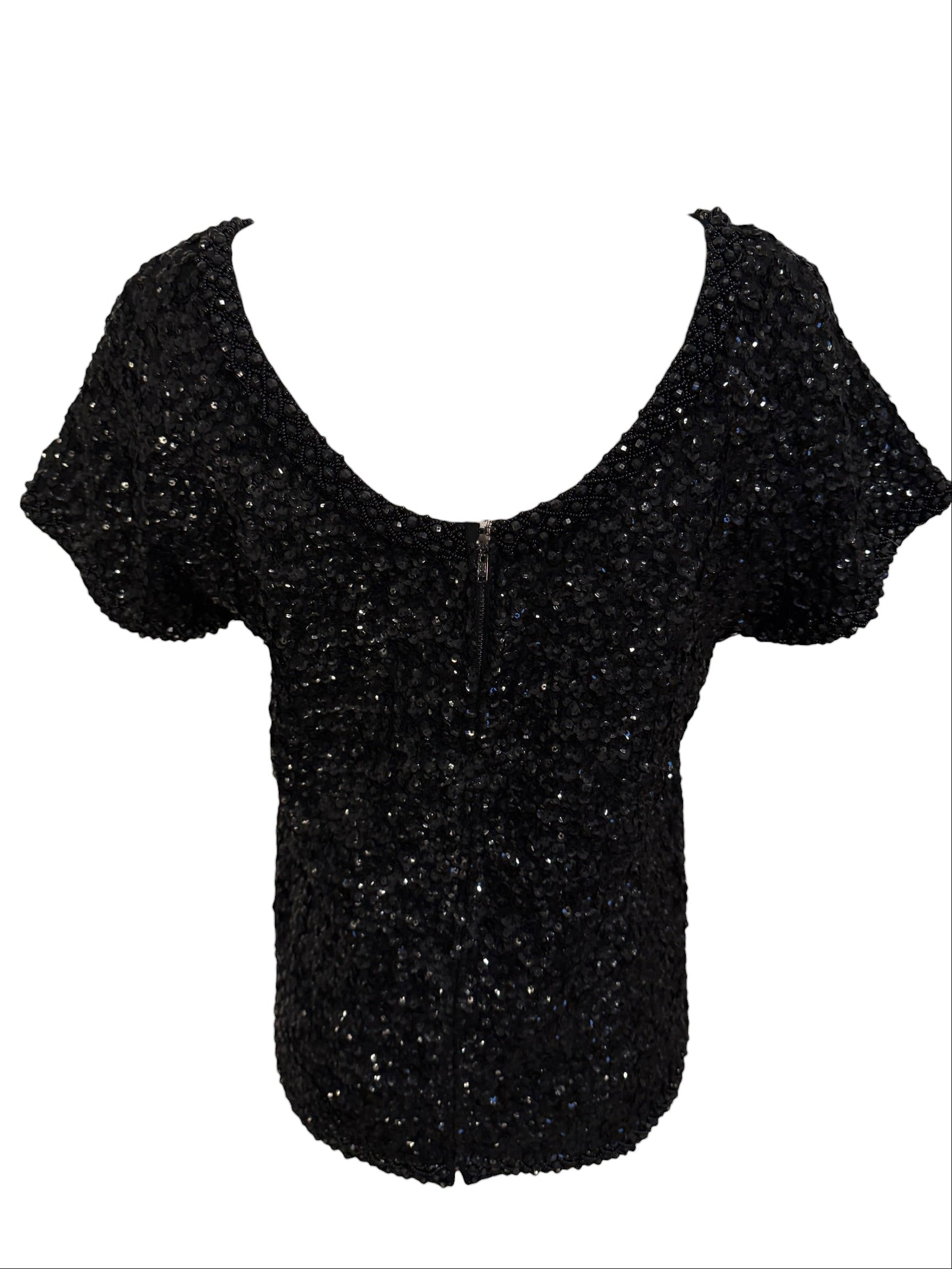Black glittery top on a white background