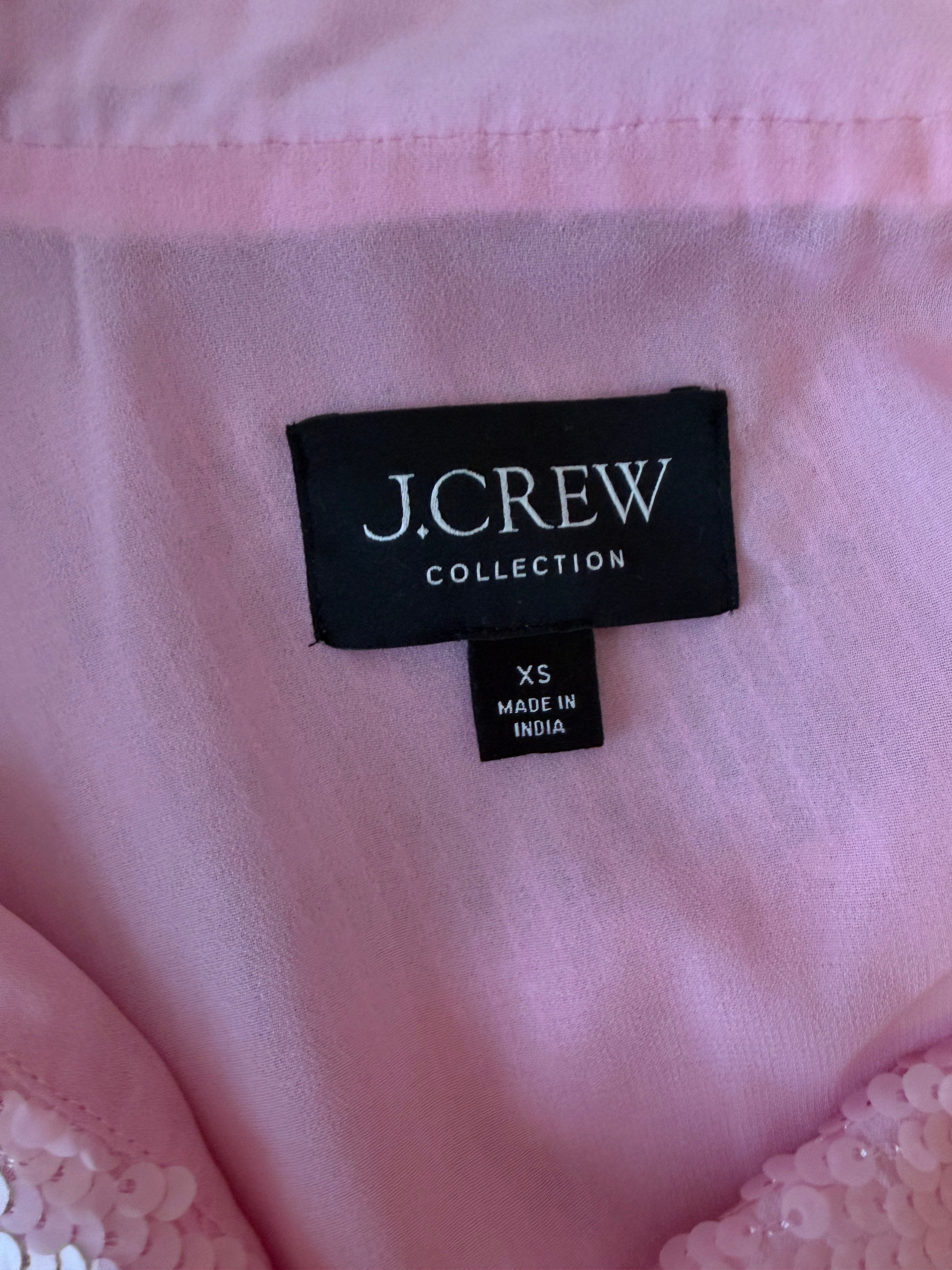 J.Crew label on a pink garment with lace details