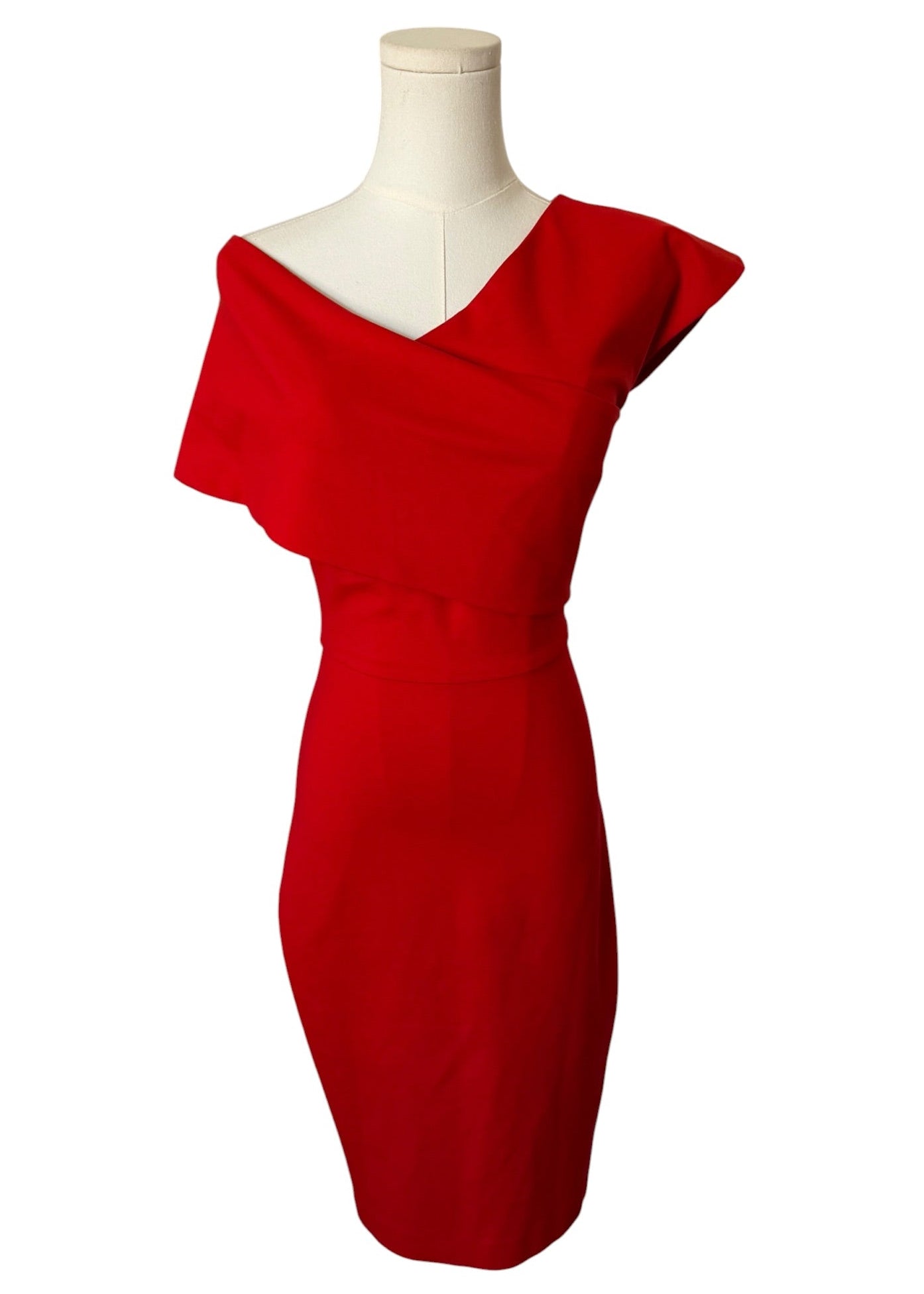 Red dress on a mannequin against a white background
