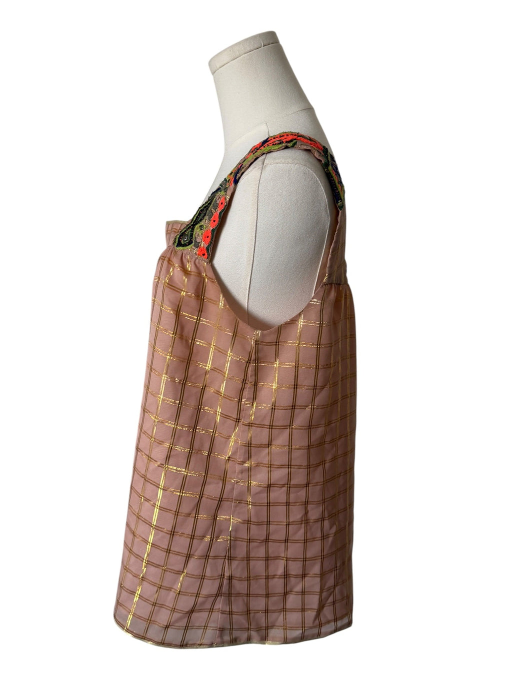 Brown checkered dress on a mannequin with a white background