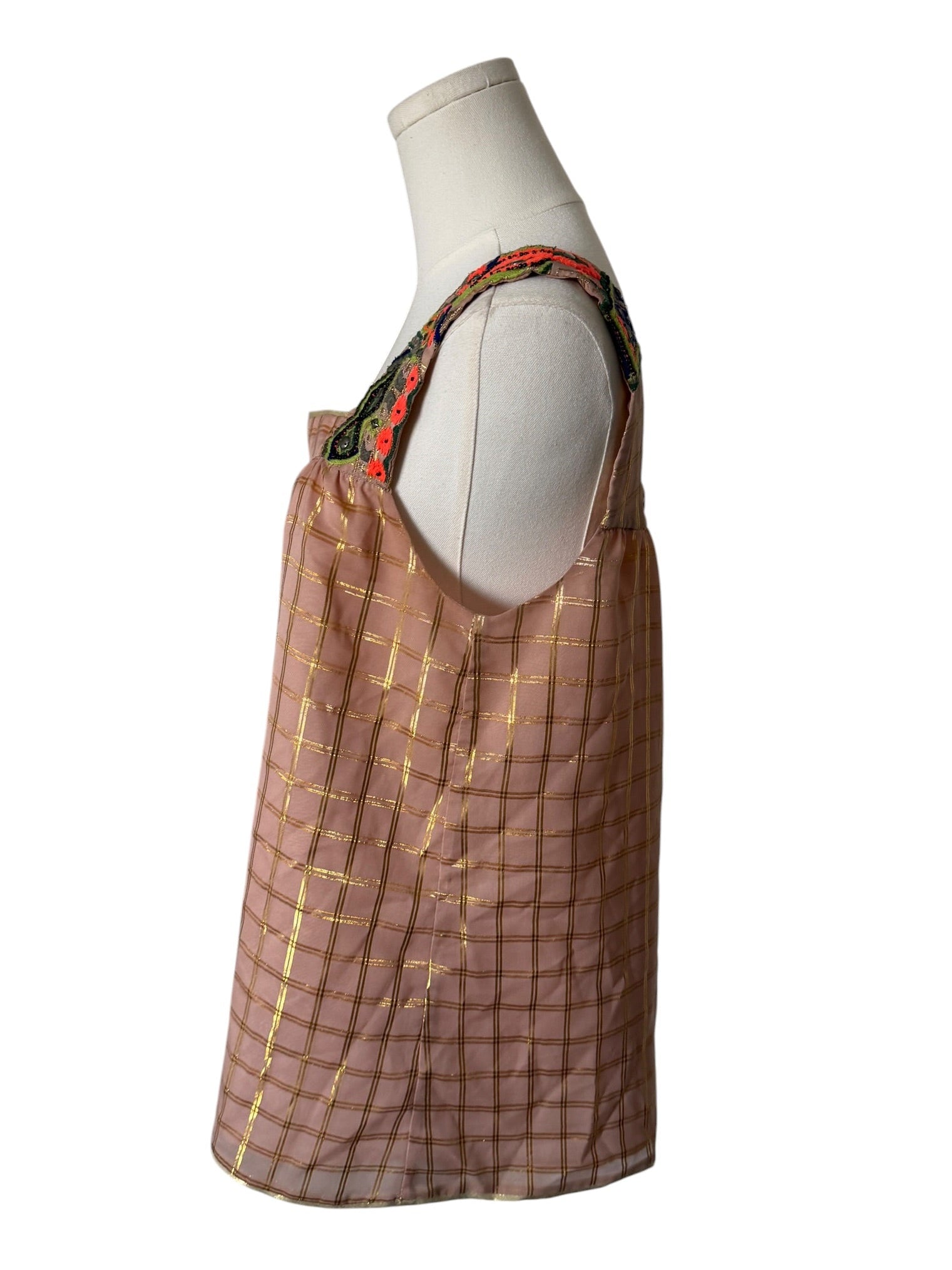 Brown checkered dress on a mannequin with a white background